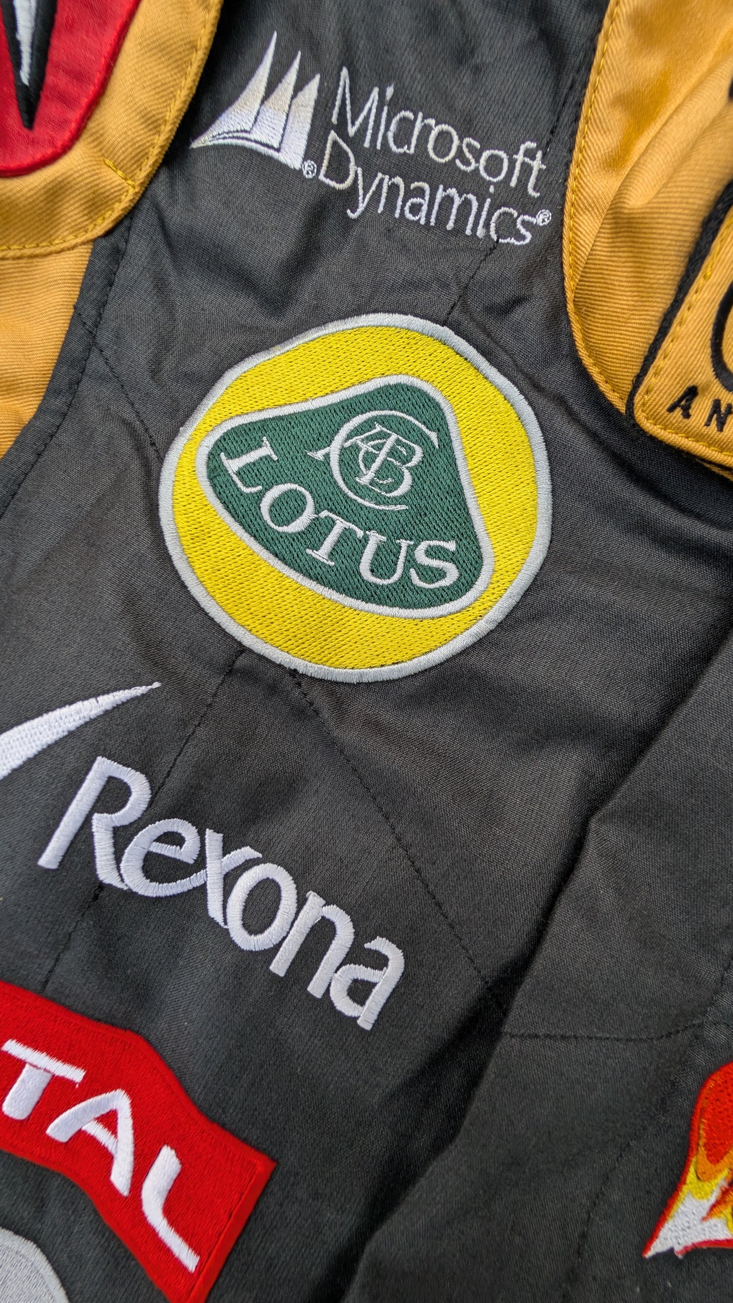 Romain Grosjean Signed 2013 Lotus F1 Team Alpinestars Race Suit