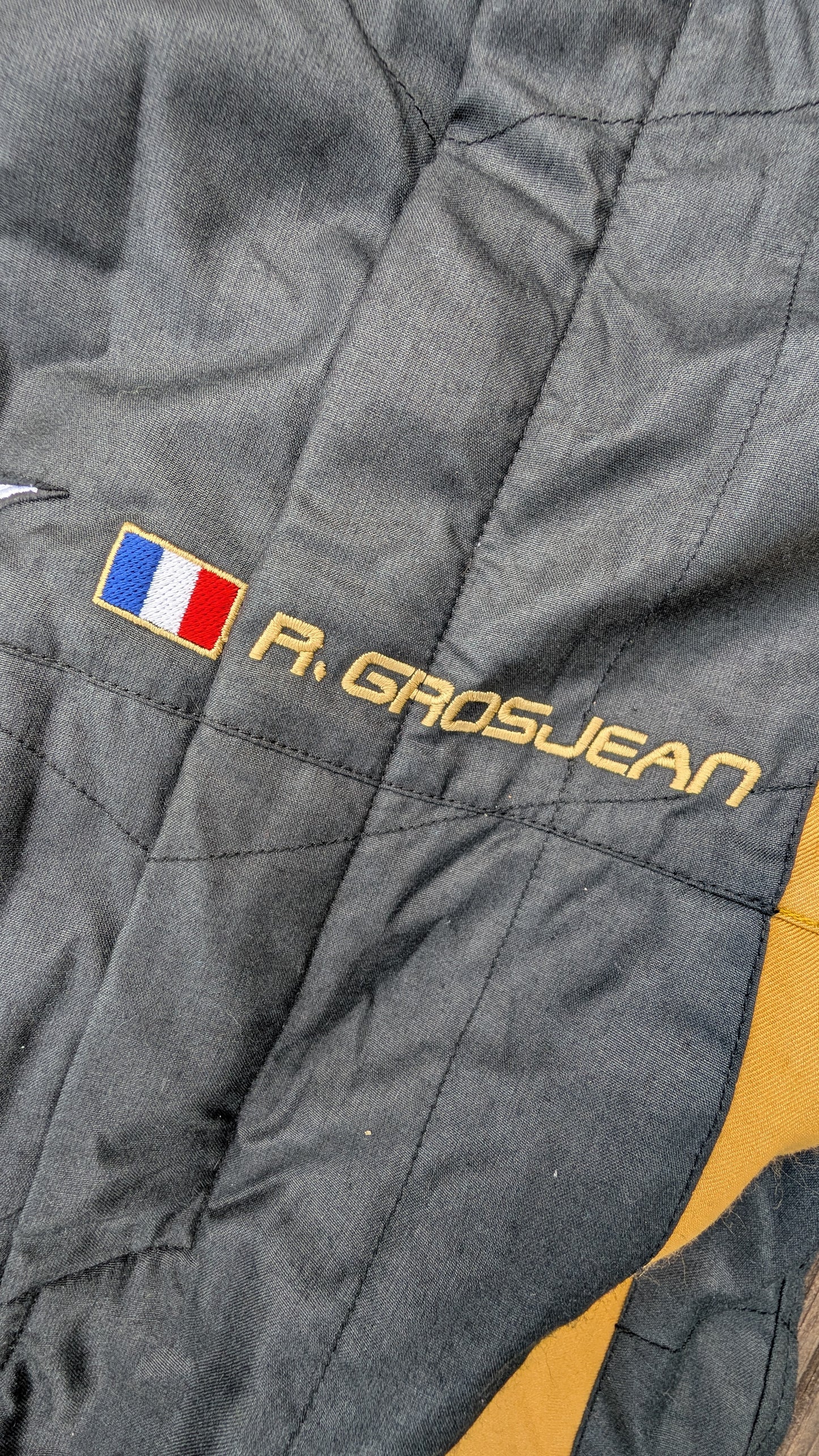 Romain Grosjean Signed 2013 Lotus F1 Team Alpinestars Race Suit